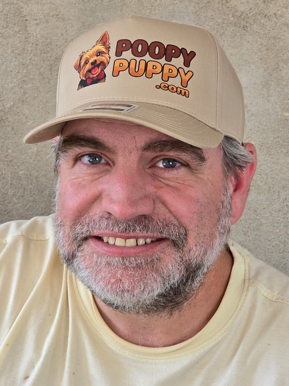 Benji Sanders, PoopyPuppy founder, in a PoopyPuppy hat